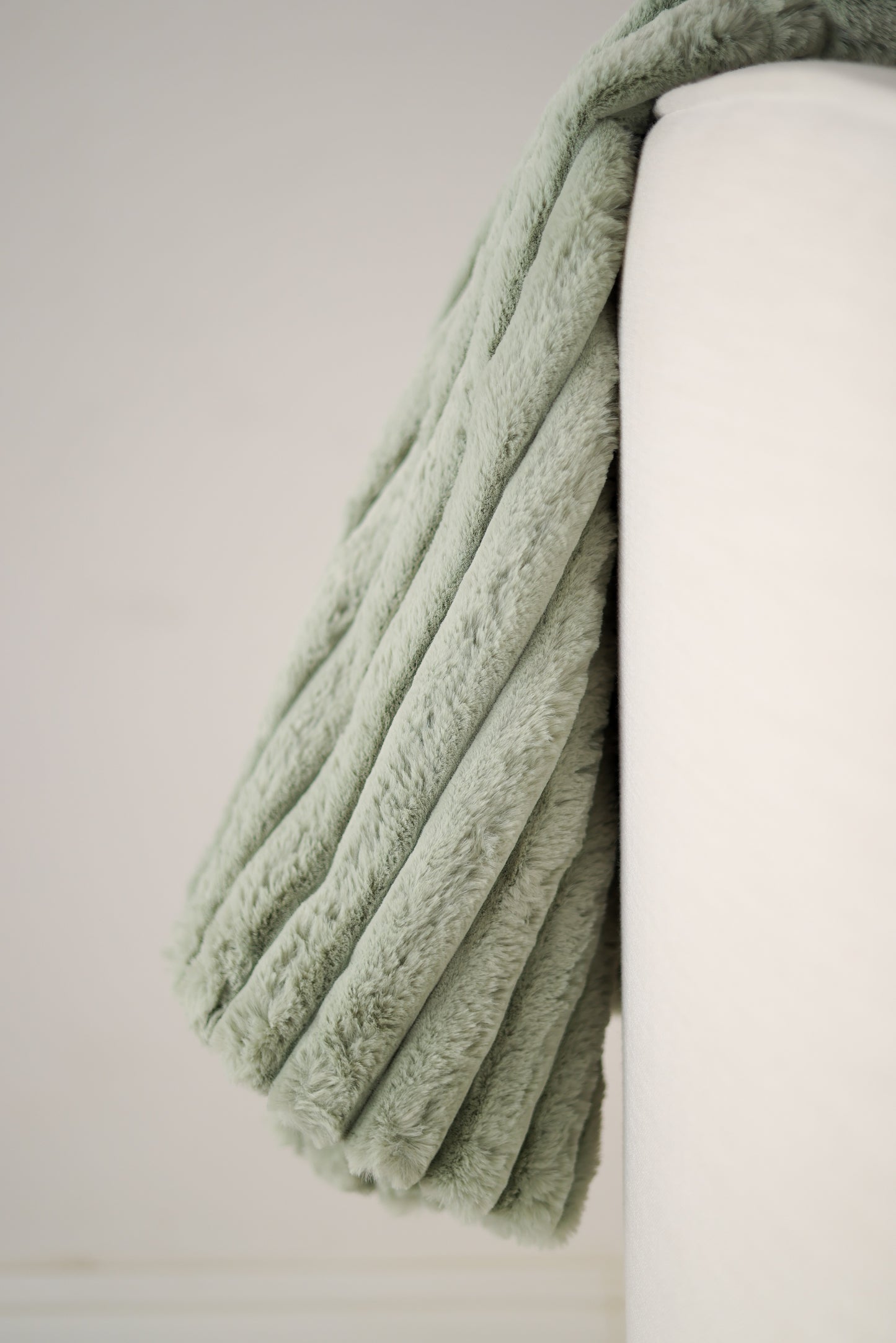 Mint green ribbed fur throw