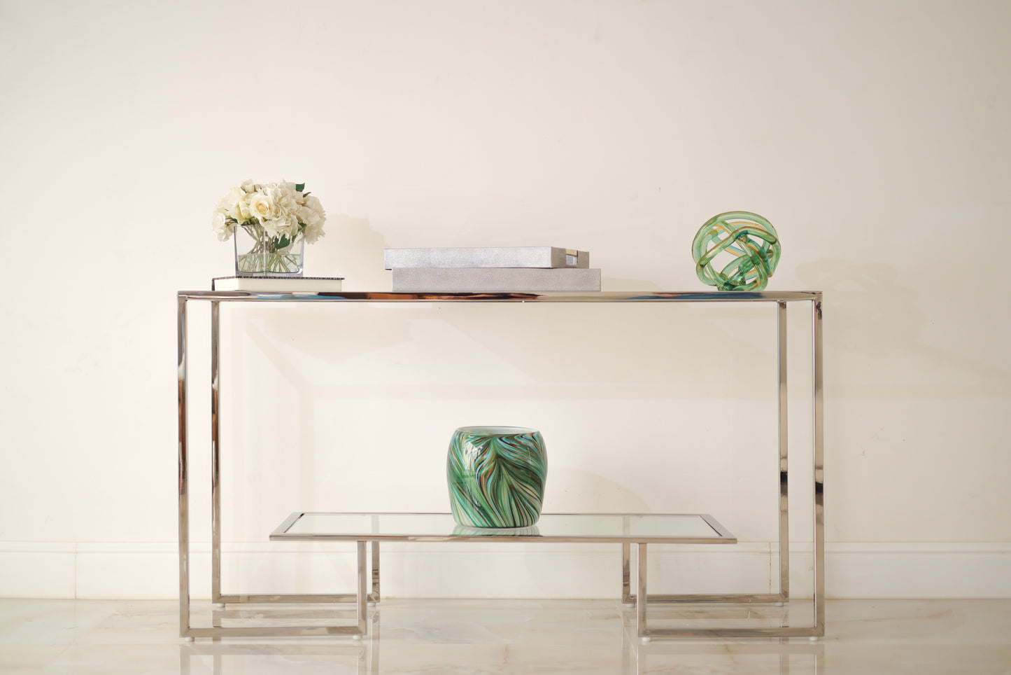 Steel console with glass shelf