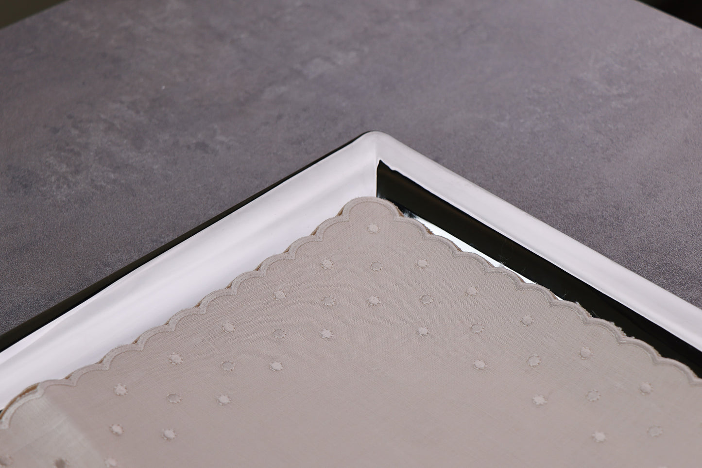 Tray mats embroidered with dots