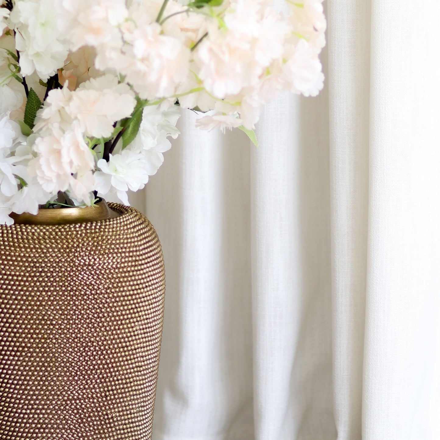 Gold beaded vase