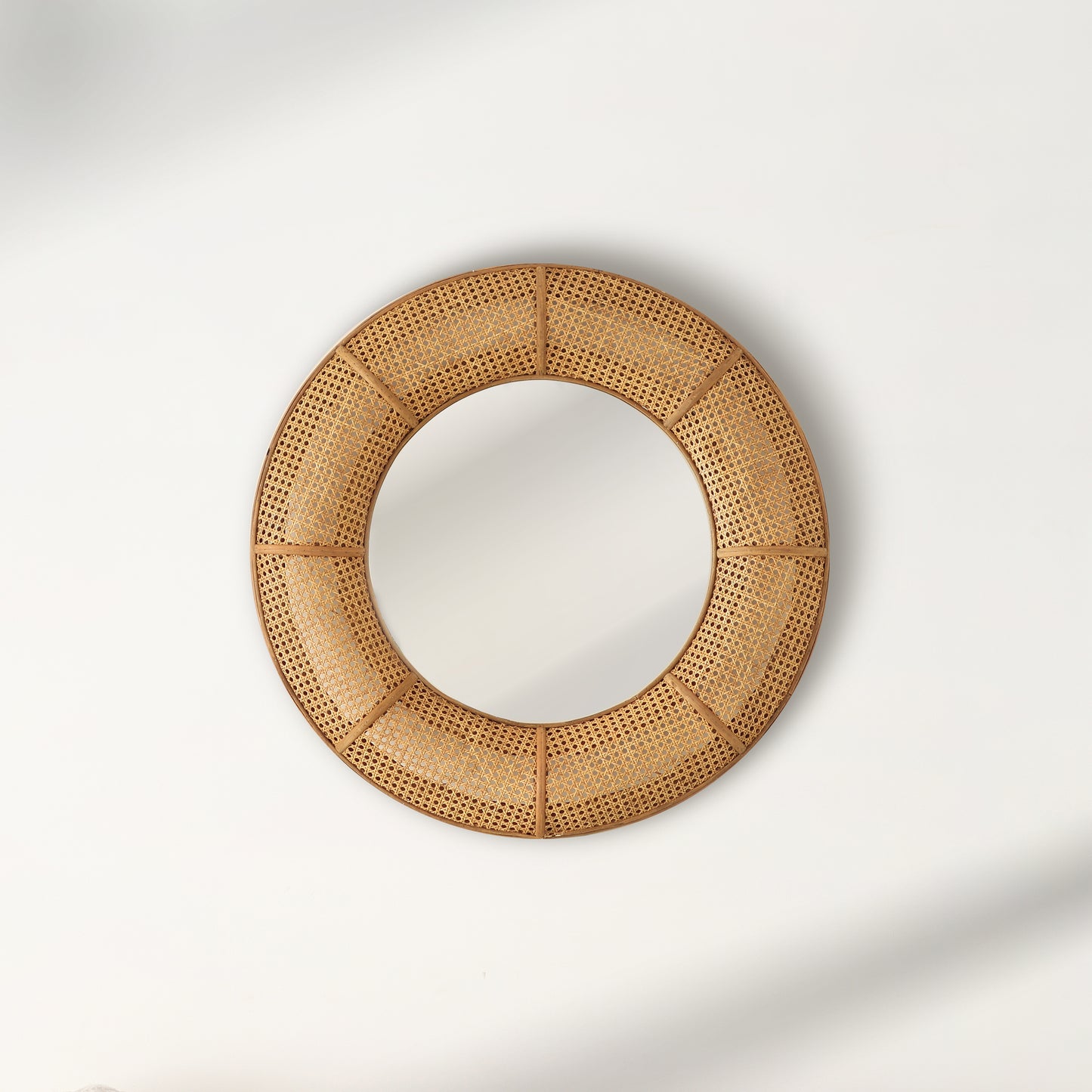 Round rattan wall mirror