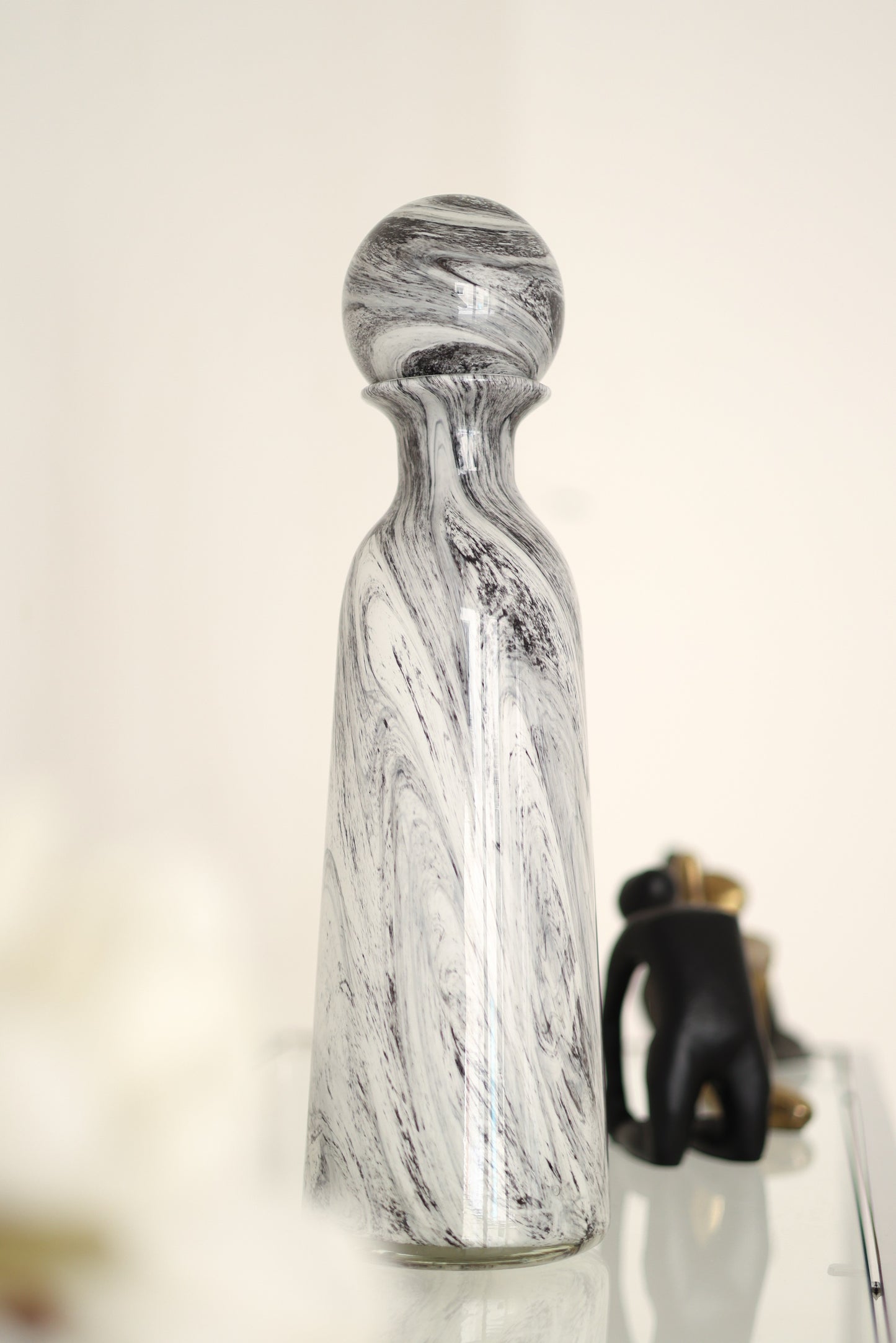 Tall hand blown  bottle with ball top